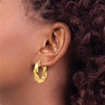 10ky Polished 5.25mm Hollow Twisted Round Hoop Earrings - Product Photo