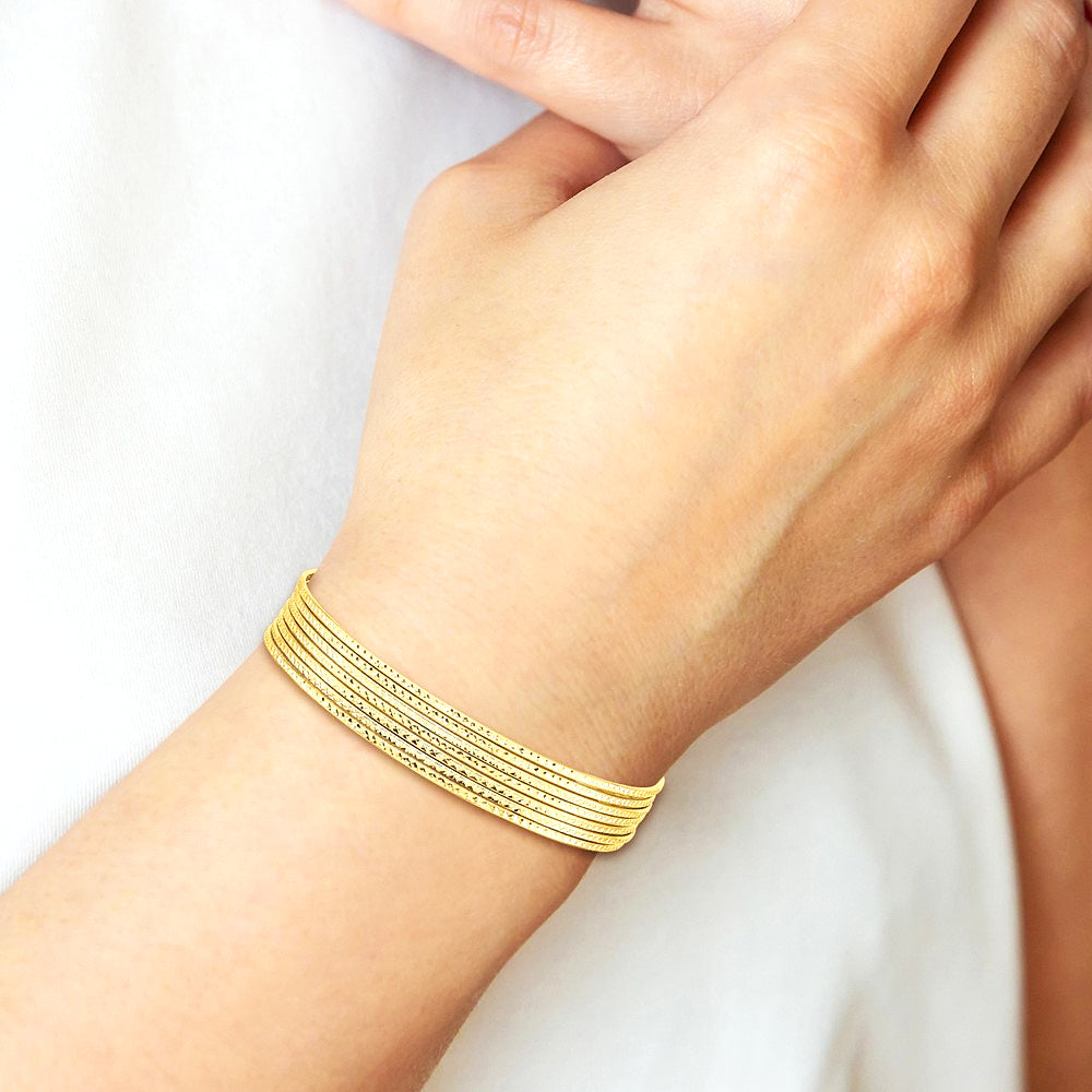 14K Yellow Gold Oversized w/ Dangle Heart Set of 7 Slip-on Textured Bangles - Product Photo