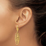 Leslie's 14K Polished and Textured Ovals Dangle Earrings - Product Photo
