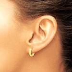 14K Yellow Gold Polished and Diamond-cut Huggie Hoop Earrings - Product Photo