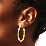 14K Yellow & Rhodium with Rhodium Polished and Dia-Cut Oval Hoop Earrings - Product Photo