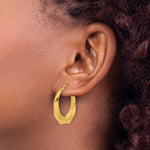 Leslie's 14K Polished Twisted Hollow Hoop Earrings - Product Photo