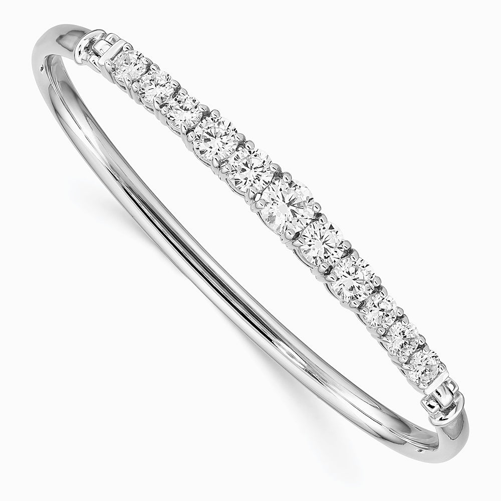 Sterling Silver Rhodium-plated Graduated CZ Hinged Bangle - Product Photo