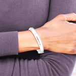 Sterling Silver Rhodium-plated Diamond-Cut 10.25mm Hinged Bangle Bracelet - Product Photo
