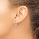 Sterling Silver Rhodium Diamond. Huggie Earrings - Product Photo