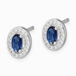 Sterling Silver Rhodium-plated Blue and White CZ Oval Stud Earrings - Product Photo