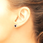 Sterling Silver Rhodium-plated Polished Garnet Oval Post Earrings - Product Photo