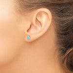 Sterling Silver RH-pltd Polished Blue Created Opal Teardrop Stud Earrings - Product Photo