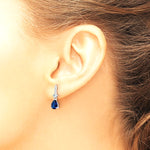 Sterling Silver Rhodium-plated CZ and Blue Glass Post Dangle Earrings - Product Photo