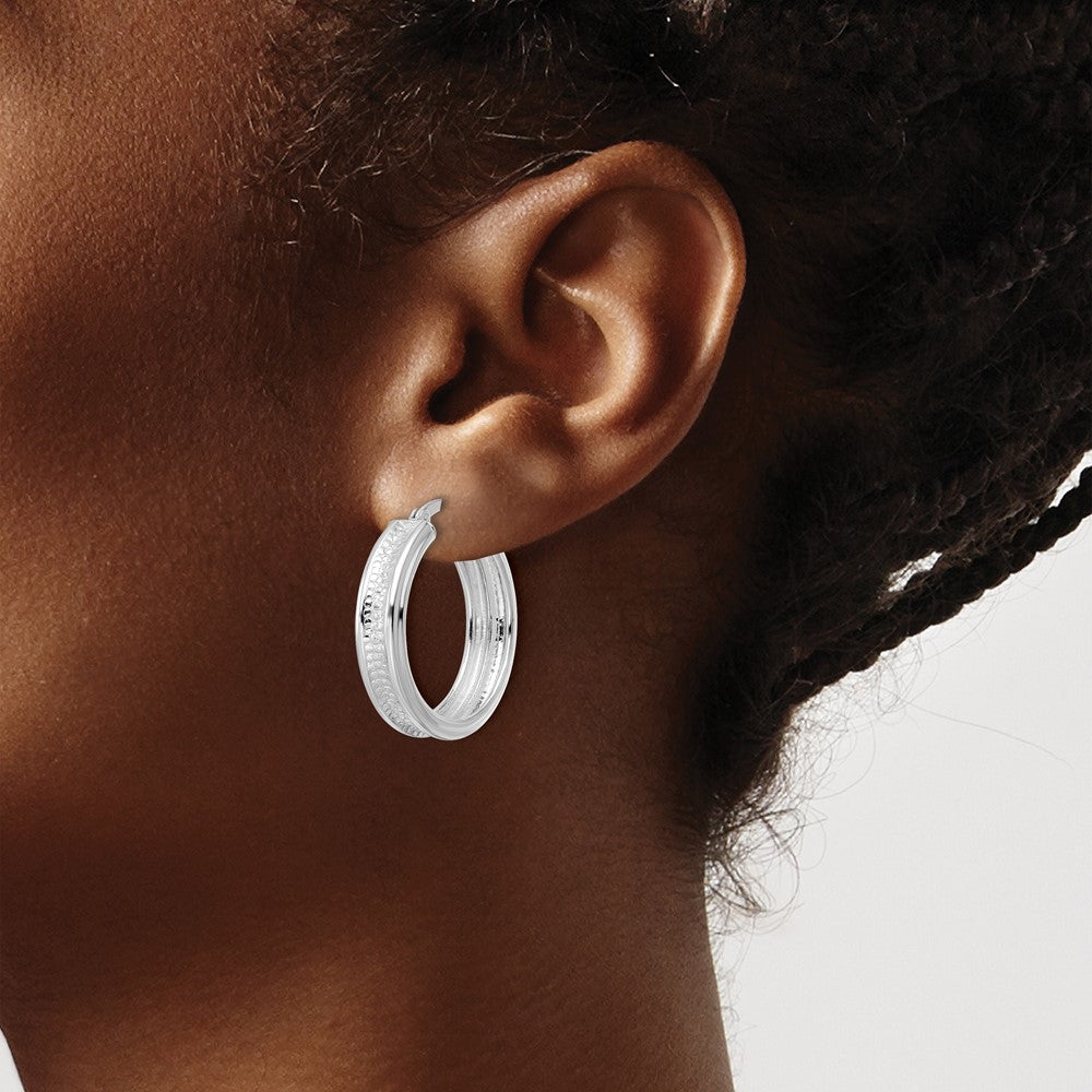 Sterling Silver Polished and Textured Circle Hoop Earrings - Product Photo