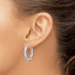 Sterling Silver Rhodium-plated Patterned Twisted 4x25mm Hoop Earrings - Product Photo