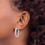 Sterling Silver Rhodium-plated Diamond-cut 4mm Oval Hoop Earrings - Product Photo