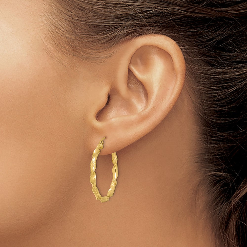 Sterling Silver Gold-plated 3x30mm Diamond-cut Twisted Hoop Earrings - Product Photo