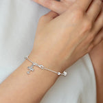 Sterling Silver Polished and Beaded CZ Cross Bracelet - Product Photo