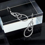 Leslie's Sterling Silver Rh-plated Polished/Textured Ovals Dangle Earrings - Product Photo