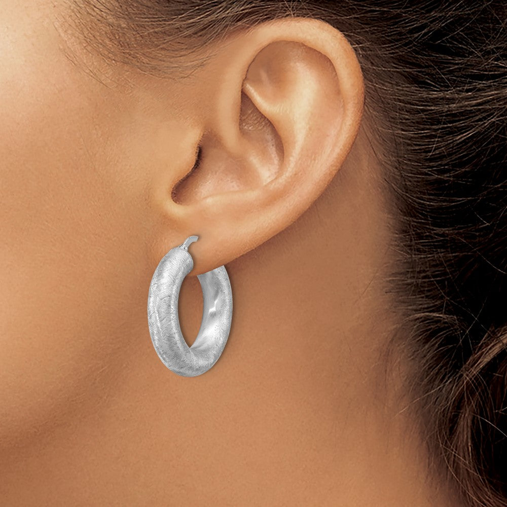 Leslie's Sterling Silver RH-plated Radiant Essence Hoop Earrings - Product Photo