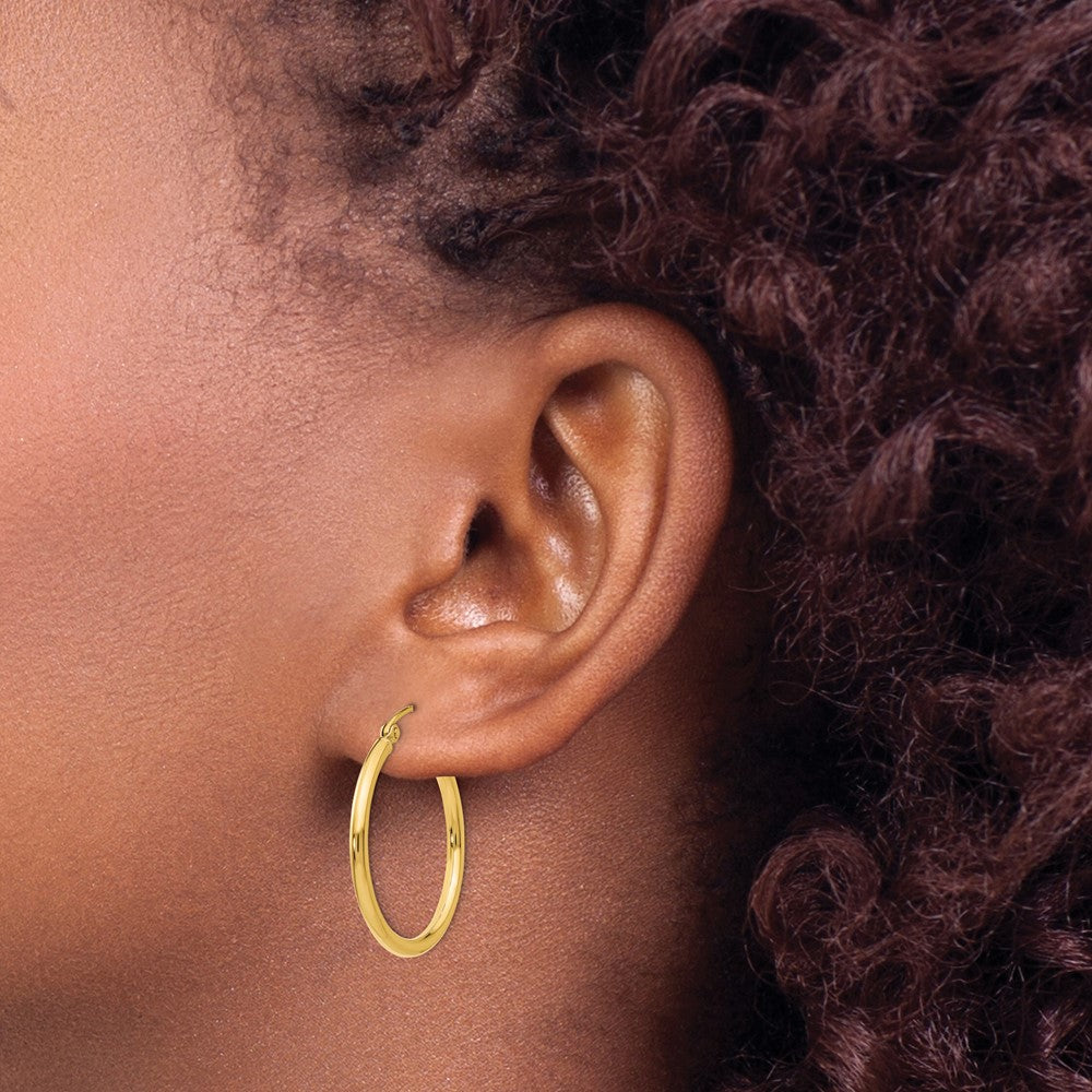 14K Yellow Gold Polished 2x25mm Lightweight Tube Hoop Earrings - Product Photo