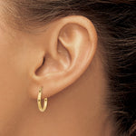 14K Yellow Gold Polished 2x15mm Lightweight Tube Hoop Earrings - Product Photo