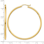 14K Yellow Gold Polished 2x50mm Lightweight Tube Hoop Earrings - Product Photo