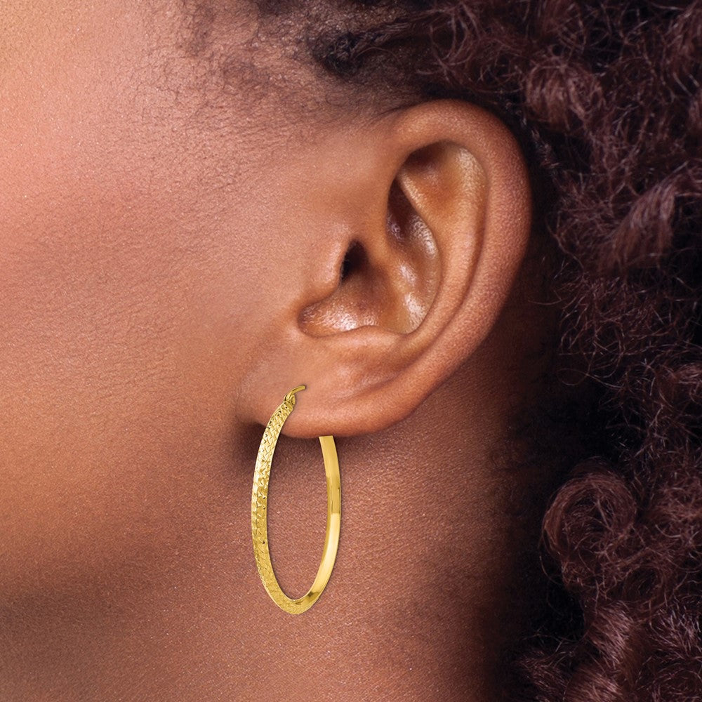 14K Knife Edge Diamond-cut Hollow Hoop Earrings - Product Photo