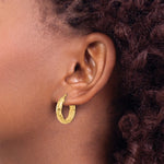 14K Polished and Textured Hoop Earrings - Product Photo