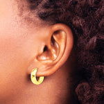 14K Yellow Gold Polished and Diamond-cut Huggie Hoop Earrings - Product Photo