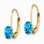 14K Yellow Gold 6x4mm Oval Blue Topaz Leverback Earrings - Product Photo