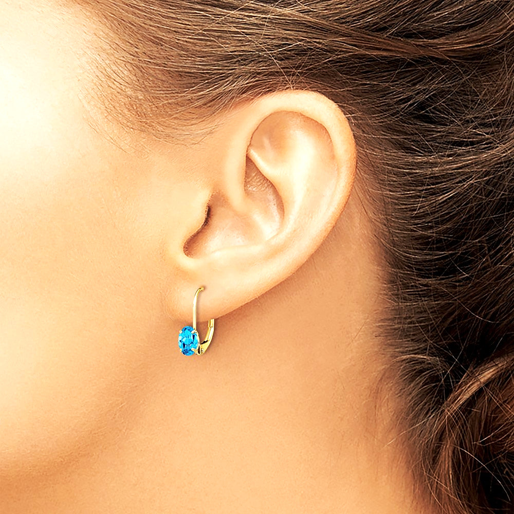 14K Yellow Gold 6x4mm Oval Blue Topaz Leverback Earrings - Product Photo