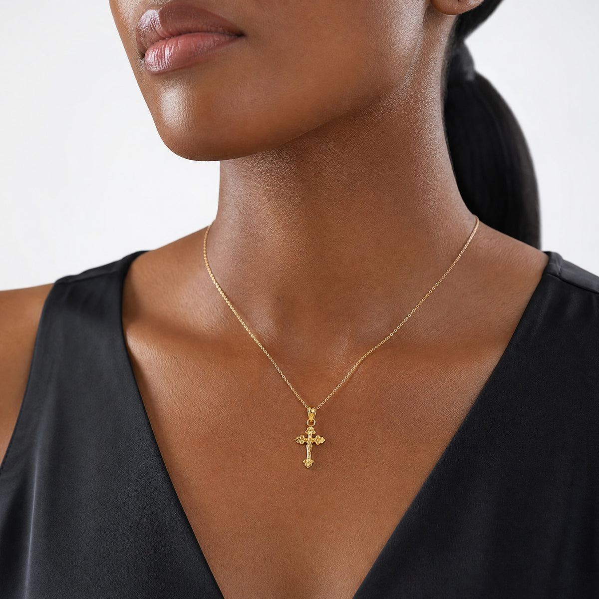 10k Tiny Crucifix Pendant - Model Shot