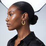 10k Satin and Polished Hollow Fancy Earrings - Model Shot
