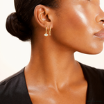 10K Polished Clear & Blue CZ Dangle Evil Eye Hinged Hoop Earrings - Model Shot