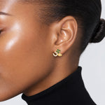 10K Polished Green & Clear CZ Good Luck Post Earrings - Model Shot