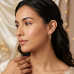 Leslie's 10K Polished D/C Oval Hoop Earrings - Model Shot