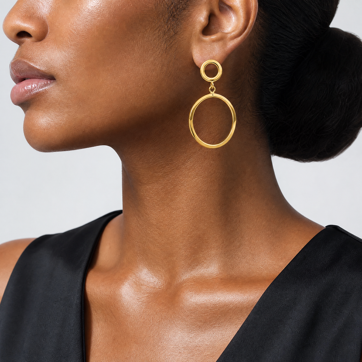 Leslie's 10K Polished Round Post Dangle Earrings - Model Shot