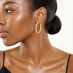 Leslie's 10K Polished Twisted Round Hoop Earrings - Model Shot