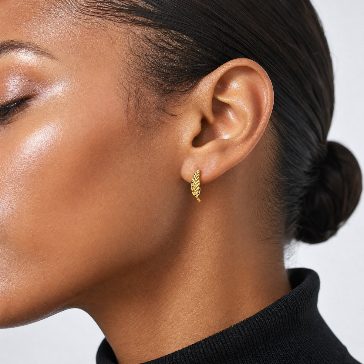 Leslie's 10K Polished and Diamond-cut Leaf Post Earrings - Model Shot