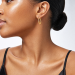 10K 1.5x15mm Diamond Cut Hoop Earrings - Model Shot