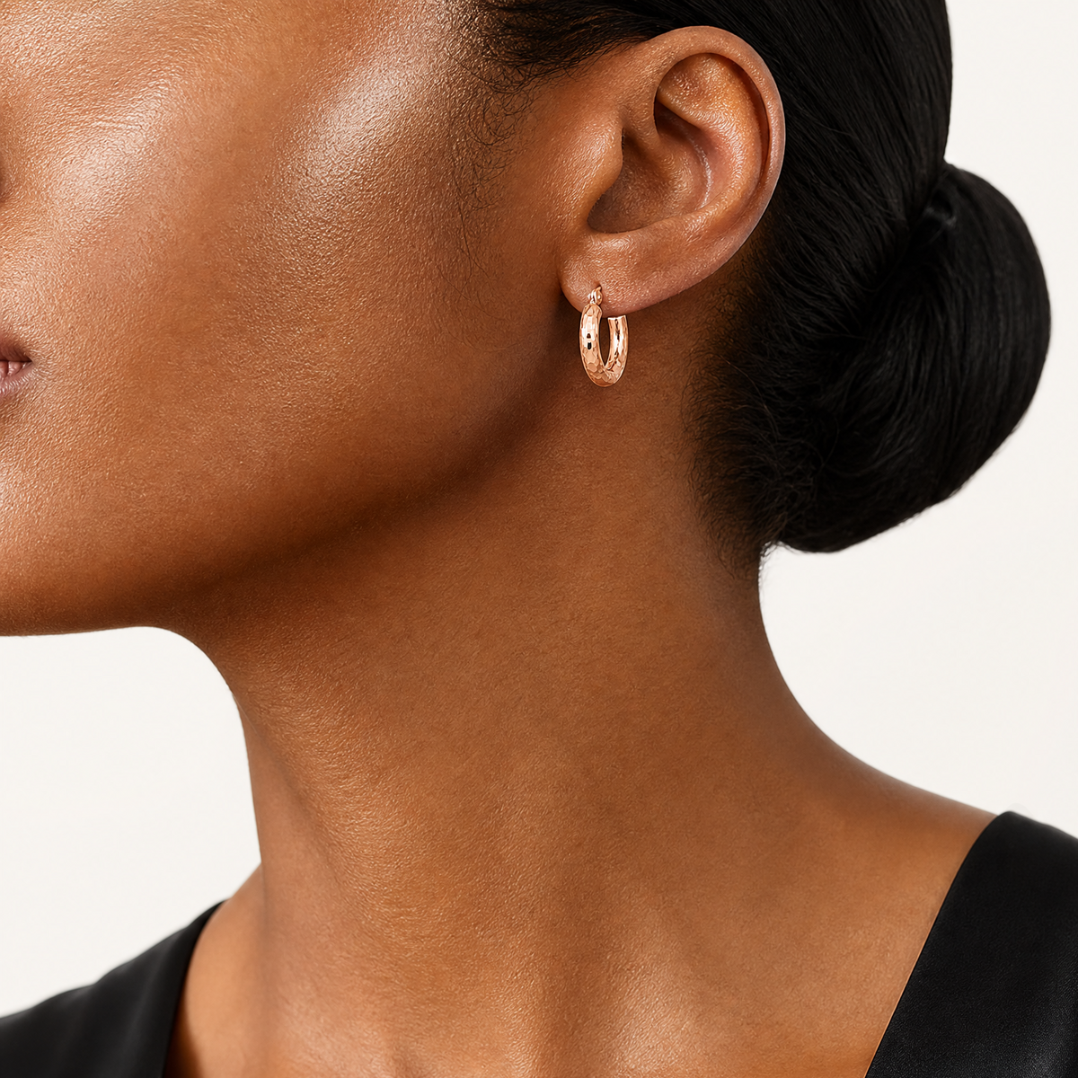 10K Rose Gold Polished Lightweight Small Diamond-cut Tube Hoop Earrings - Model Shot