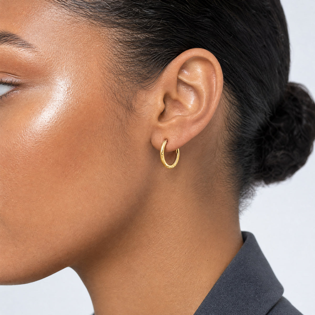 10k 1.5mm Satin Diamond-cut Endless Hoop Earrings - Model Shot