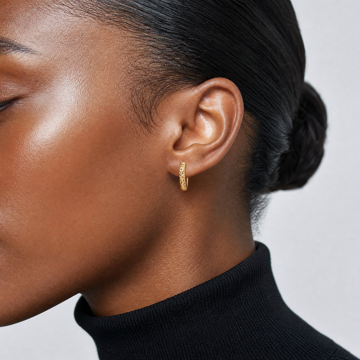 10k Diamond-cut Hinged Hoop Earrings - Model Shot