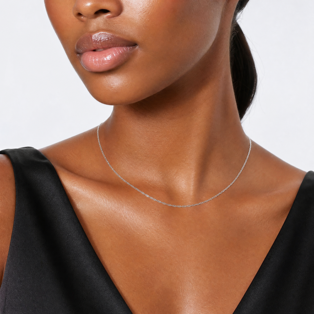 14k White Gold .6 mm Carded Cable Rope Chain - Model Shot