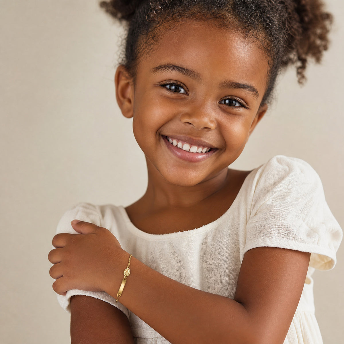 14K Polished Miraculous Medal Children's ID Bracelet - Model Shot