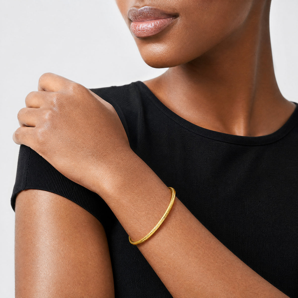 14k 3mm Diamond-cut Tube Slip-on Bangle - Model Shot