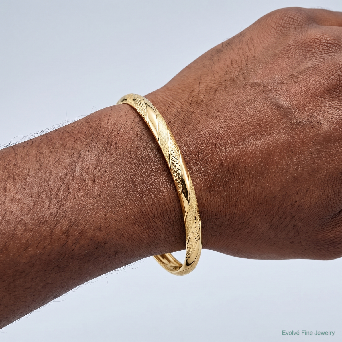 14k Twisted Diamond-cut Flexible Bangle - Model Shot