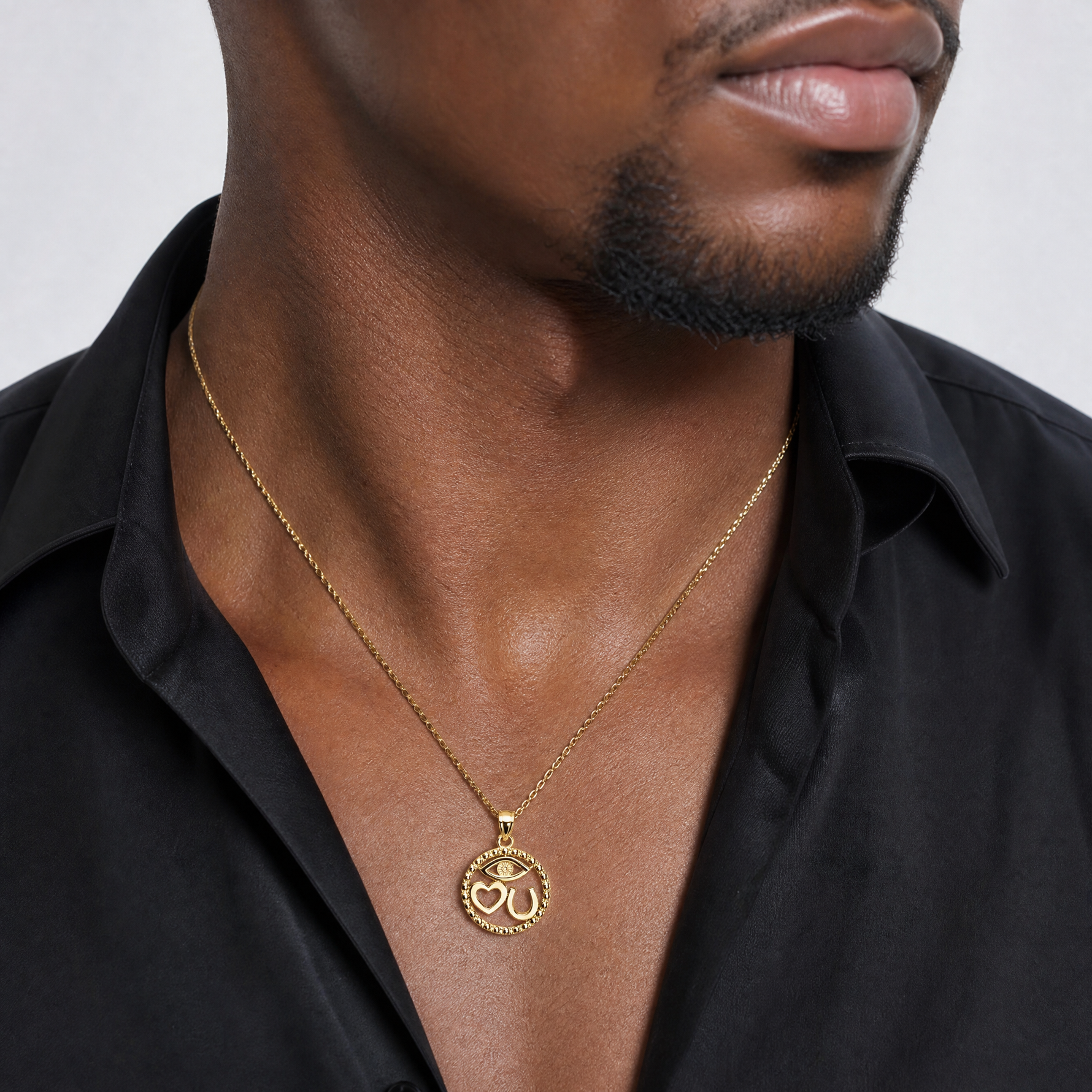 14k Polished Heart Evil Eye And Horse Shoe In Circle Pendant - Model Shot