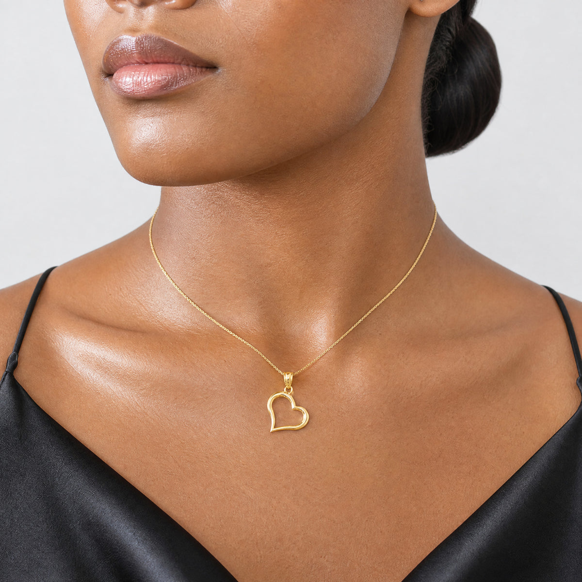 14K Polished Dangling Heart Pendant - Model Shot
