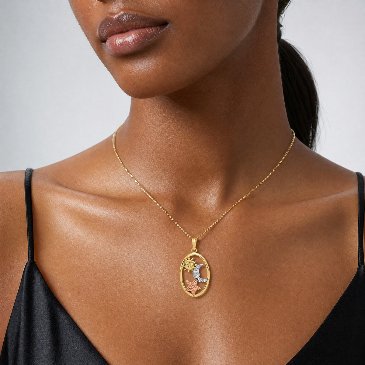 14k Two-tone w/White Rhodium Sun, Moon and Star Oval Pendant - Model Shot
