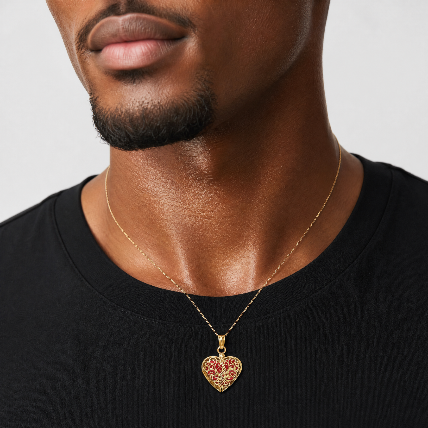 14K 3-D Reversible Heart Opens Charm - Model Shot