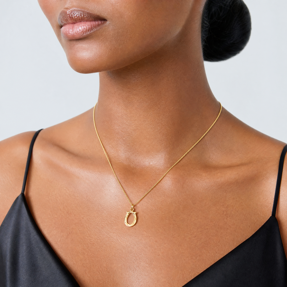 14k Solid Polished Horseshoe Charm - Model Shot