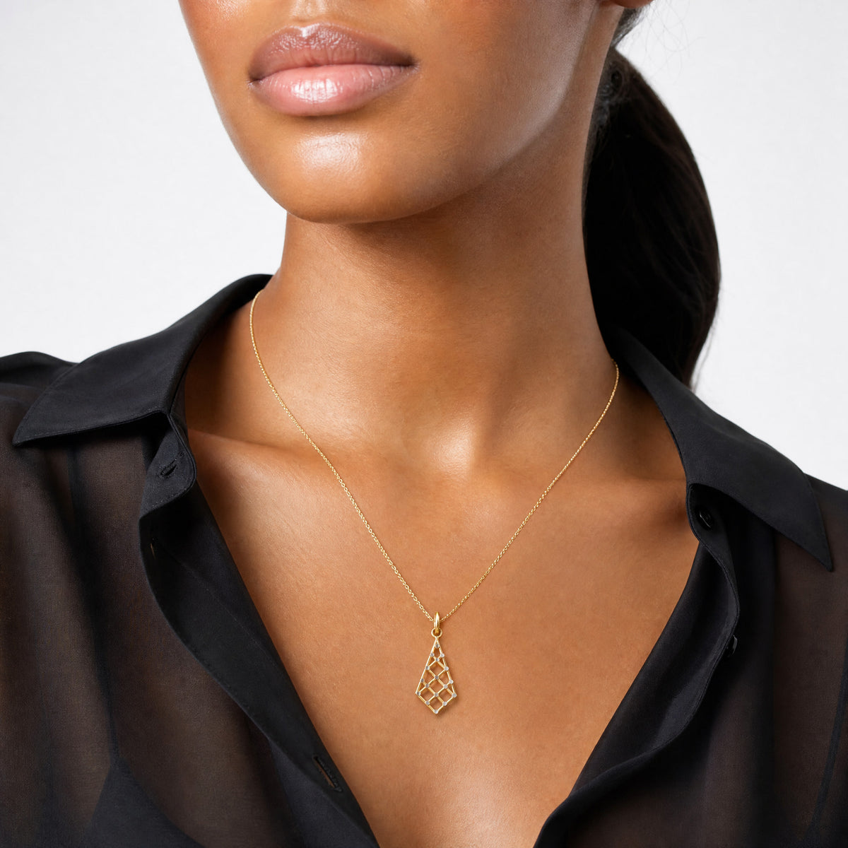 14K w/Rhodium D/C Small Criss-Cross Charm - Model Shot